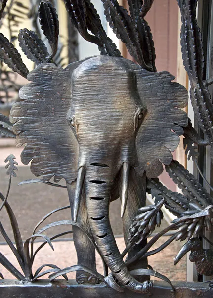 Close-up of an elephant design on the larger African Gates.